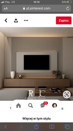 an image of a living room with a tv on the wall