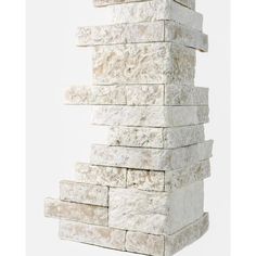 a stack of white marble blocks stacked on top of each other