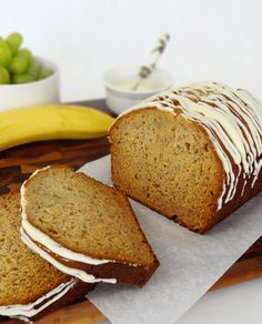 two slices of banana bread with white icing