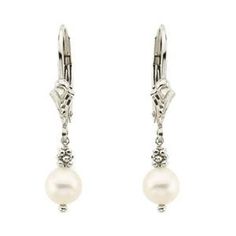 "Such a fabulous pair of freshwater cultured white pearl dangle earrings hand set in 14K white gold. The white gold leverback settings have a nicely detailed vintage style appearance that works very well with the pearls and yellow gold bead cluster. Vintage look earrings are a nice size with a total drop of 28.5mm from top to bottom ( 1 1/8\" drop). Pearl size is 5.5 - 5.8mm (1/4\") in diameter. Excellent pearl quality with good luster, silky appearance, and great surface condition. Unique pair White Gold Dangle Jewelry With Pearl Charm, Elegant Akoya Pearl Earrings For Anniversary, White Gold Dangle Earrings With Pearl Charm, Elegant Pearl White Pearl Earrings For Anniversary, Classic White Pearl Earrings With Lever Back, White Gold Akoya Pearl Dangle Earrings, Elegant Pearl Charm Jewelry For Anniversary, White Gold Jewelry With Pearl Charm For Evening, Classic White Bridal Earrings With Elegant Design