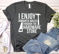 "*We Are Not Affiliated With Any Other Company, Brand, Or Business. I Enjoy Romantic Walks Through The Hardware Store - Dad Shirt, Dad Gift, Construction Worker Shirt, Woodworker Gift, Carpenter Shirt, Funny, Premium Bella Canvas Unisex Adult Mens Womens Shirt, Christmas Shirt Gift 2/24/2022 - This Is A Premium Bella Canvas Unisex Shirt - PLEASE READ INFORMATION BELOW: This \"I Enjoy Romantic Walks Through The Hardware Store\" Shirt will brighten up your day! Tired of boring shirts? If so, you'v Carpenter Shirt, Tool Shirt, Carpenters Shirts, Bbq Shirt, Funny Fathers Day Gifts, Wood Working Gifts, Construction Worker, Womens Shirt, Shirt Store