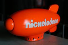 an orange toy with the word nickelboom on it's side and nose