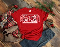 Youth Polar Express Shirt - Polar Express Shirt - Polar Express Shirt - Kids Christmas Shirt - Christmas Shirt This is a super adorable Kids Polar Express Ticket Shirt. Perfect for your visit with Santa, Christmas Eve, Polar Express Train Ride or School. Made with Heat Transfer Vinyl. This is a unisex fit shirt made with 100 % Cotton. Please check measurements before ordering. Please be aware we are not responsible for sizing errors. We love custom orders. Just message us! Thank you for shopping Polar Express Train Ride, Winter Things, Merry Christmas Yall, Christmas Shirts For Kids, Polar Express, Family Christmas Shirts, Silhouette Files, Christmas Tees, Holiday Shirts