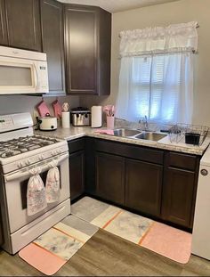 the kitchen is clean and ready to be used as a family room or playroom