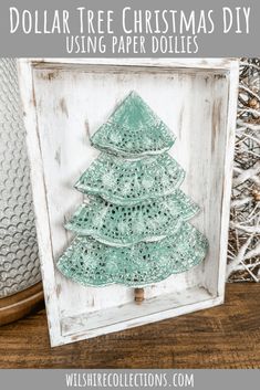 dollar tree christmas diy using paper doilies in an old window frame with text overlay