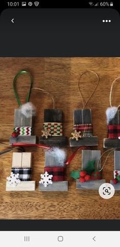 christmas decorations made out of legos on a wooden table