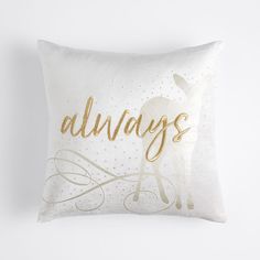 a white pillow with gold lettering that says alwayss on the front and back side