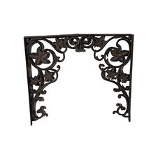 an ornate iron frame on a white background