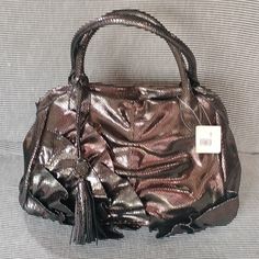 Beautiful And Stunning Nwt Vince Camuto Rainbow Snake Skin Leather Shoulder Bag With Gun Metal Hardware. Two Shoulder Straps. Zipper Top Closure. Interior Has A Black Fabric Lining With 2 Open Slip Pockets And A Zipper Pocket. In Brand New Unused Gift Giving Condition. Great Xmas Gift! Purple Crossbody Satchel For Evening, Purple Evening Satchel Shoulder Bag, Edgy Shoulder Bag With Silver-tone Hardware, Metallic Shoulder Bag With Silver-tone Hardware For Shopping, Metallic Shoulder Bag With Silver-tone Hardware, Rainbow Snake, Vince Camuto Bag, Black Leather Bag With Silver-tone Hardware, Black Nylon Shoulder Bag With Silver-tone Hardware