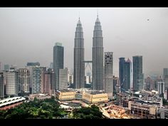 the city is full of tall buildings and skyscrapers in this view from an observation point