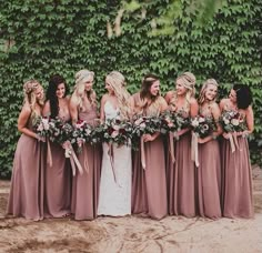 a group of women standing next to each other