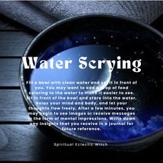 a blue bowl with water in it sitting on top of a wooden table