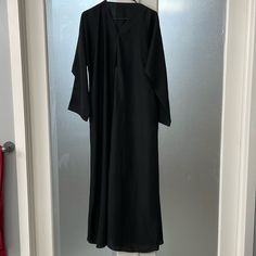 Black Abaya, Full Length. Brand New, Great Condition. Never Worn Before, Perfect For Ramadan Formal Long Solid Abaya, Black Long Khimar For Eid, Long Black Abaya For Eid, Black Long Thobe For Eid, Black Formal Long Kaftan, Formal Black Long Sleeve Kaftan, Black Long Formal Thobe, Formal Black Long Thobe, Formal Long Black Thobe