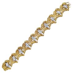 An antique and vibrant bracelet showcasing an intricately beautiful leaf-like designed set in a 18k Yellow Gold and accented with 20 trillion cut diamonds weighing 7.40 carats total. Luxury Yellow Gold Leaf-shaped Jewelry, Retro Bracelet, Golden Leaf, Bracelet Diamond, Leaf Bracelet, Golden Leaves, Lovely Jewellery, Diamond Bracelets, Diamond Cuts