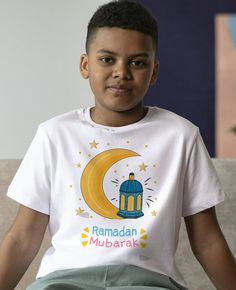 Welcome to FkDesingCrafts  Ramadan Mubarak Shirt is a special gift for kids during Ramadan. Kids can wear this fantastic shirt when gathering in the iftar. It is essential for children to feel the importance of Ramadan. This shirt makes them happy and reminds them how particular the month is.  GILDAN Brand will be used for the Ramadan Kareem shirt. It is %100 cotton, comfortable, and premium soft.    Different sizes will be available. 2T,3T,4T,5T for kids, and XS, S, M, L for youth.  Material:  It is a stretchable and long-lasting material. CPISA certified for use on children's clothing. Washing: Cold wash, no softener If you have any questions, please reach out. Thank you! White Cotton Tops For Eid, Casual White Top For Eid, Printed Cotton T-shirt For Festivals, White Crew Neck T-shirt For Festivals, Eid Cotton Printed Tops, Cotton Printed Tops For Eid, White Graphic Print T-shirt For Festivals, Ramadan Kids, Muslim Kids