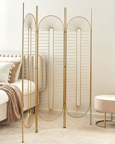 the room divider is made from gold metal