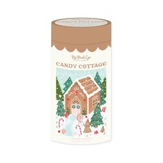 a canister with a gingerbread house on it