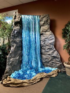 a fake waterfall in the middle of a room