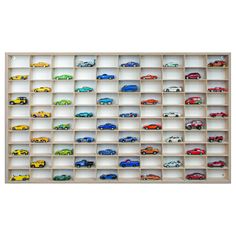 a wooden shelf filled with lots of toy cars