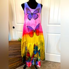 New! Beautiful Vibrant Colorful Butterfly Maxi Sleeveless Dress. Polyester Blend Material With Gorgeous Vibrant Colorful Dress. Large Ruffle Bottom. Pleated Darts. Scoop Neckline. Large Butterfly Colors. Multicolor Sleeveless Sundress For Summer, Sleeveless Multicolor Summer Sundress, Multicolor Print Sleeveless Sundress For Summer, Colorful Sleeveless Summer Dress For Vacation, Vibrant Sleeveless Maxi Dress With Vibrant Print, Sleeveless Vibrant Print Summer Maxi Dress, Colorful Sleeveless Beach Dress, Multicolor Print Sleeveless Dress For Spring Vacation, Sleeveless Vibrant Print Maxi Dress For Summer