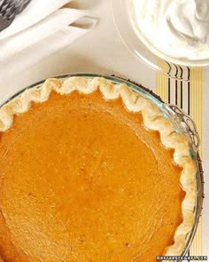 a pie sitting on top of a white table