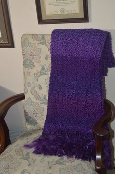 Handmade, knitted, purple Prayer Shawl 20 X 60, plus fringe, made with Lion Brand® Homespun in Purple Haze #421. Do you want all of the personalization and warmth of a homemade gift, but don't have the time to make one? Look no further! This shawl is made with love and ready to ship! Beautiful, hand knitted shawl. Heirloom quality workmanship. Created in a pet free and smoke free environment. Ultra-soft to the touch. 98% Acrylic and 2% Polyester. Machine washable and dryable. This shawl was knitted of Lion Brand® Homespun yarn and in the original Prayer Shawl pattern, incorporating the Trinity Stitch and petitions for the health and well-being of the recipient. Ideal for: hospital gift, sympathy gift, housewarming present, new mother, prayer shawl, comfort wrap, chemo wrap, lap throw, bed Hand Knitted Purple Knitting Pattern, Purple Crochet Scarves One Size, Purple Crochet Yarn Scarves, Purple Crochet Scarf One Size, One Size Purple Crochet Scarf, Purple Yarn Scarf, Trinity Stitch, Prayer Shawl Patterns, 60 Plus