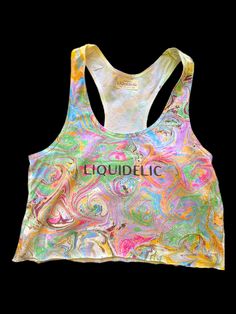 a women's tank top with the word liquidlic on it in multicolored swirls