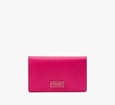 Small yet incredibly sophisticated our Katy bifold wallet is done in textured leather with its signature glossy logo plaque. | Kate Spade Katy Small Bifold Snap Wallet, Wild Raspberry Kate Spade Compact Wallet For Formal Occasions, Compact Kate Spade Wallet For Formal Occasions, Compact Formal Wallet By Kate Spade, Elegant Bifold Wallet With Gold-tone Logo Plaque, Elegant Bifold Wallet With Logo Plaque, Formal Kate Spade Leather Wallets, Luxury Leather Wallet By Kate Spade, Kate Spade Luxury Wallets For Formal Use, Kate Spade Luxury Wallet For Formal Occasions