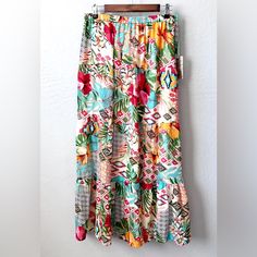 Tropical Print Maxi Skirt By Boutique Her Destiny. Bright Florals On A Taupe Background. Three Tiers. Fully Lined But Still Very Lightweight. Doesn’t Wrinkle Easily So It’s Great For Summer Travel. Waist Stretched Is 22” Brand New With Tags. Nik B57 Patterned Lined Skirt For Beach, Patterned Lined Skirt For The Beach, Beach Patterned Lined Skirt, Floral Print Tiered Skirt For Beach Season, Pink Maxi Skirt For Beach Vacation, Summer Beach Patterned Skirt, Patterned Skirt For Vacation In Spring, Multicolor Floral Print Long Skirt, Summer Patterned Skirt