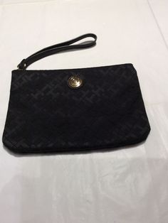 Tommy Hilfiger Black Logo Jacquard Signature Zippered Wristlet Clutch EUC. Smoke free home. See photos for details and measurements. Shipped with USPS First Class. Casual Tommy Hilfiger Shoulder Bag, Wristlet Clutch, Black Logo, First Class, Sunglasses Case, Tommy Hilfiger, Sunglasses, Zipper, ? Logo