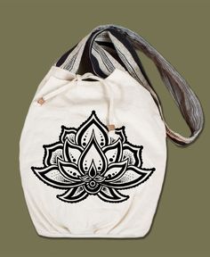 The beautiful lotus grows from the muddiest of all waters - showing how beauty can grow even in the hardest terrain. Let this Lotus Flower Canvas Boho Bag bring you inspiration with its heavy canvas, inside pocket, and tie closure. Throw your beauties inside this fully lined bag and head off to the market or a yoga session! Includes a wooden bead on the tie strings. Ethically made in Nepal, hand screen printed in the USA. 100% heavy cotton canvas. 15 x 5 x 16 inches with a 40.5 inch strap. Motivational Jewelry, Head Off, Real Leather Handbags, Flower Bag, Flower Canvas, Boho Bag, Purses Michael Kors, Cute Bag, Coach Purses