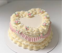 a heart shaped cake on a white plate