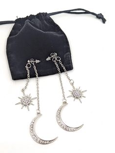 Stunning Silver  Celestial Earrings. These earring have two pieces that clip together the moon is the longest piece measuring 10cm and the star is shorter  measuring 6.5 cm. These earrings are truly a beautiful statement. Ready to ship Thank you for visiting our shop , please favourite our shop to keep up to date with New Arrivals & Sales. Follow us on socials  Instagram @thehouseofhats Tik Tok @thehouseofhats Facebook @thehouseofhats Sparkle Cocktail, Celestial Earrings, Cocktail Earrings, Vintage Style Earrings, Love Your Hair, Star Moon, Moon Earrings, Stunning Earrings, Earrings Vintage