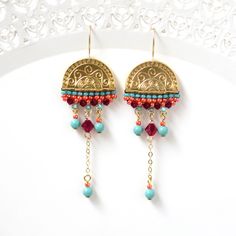 "This hand made boho chandelier earrings were created by me, using gold plated castings, Swarovski 3-5mm beads, Swarovski 3mm pearl, Miyuki round seed beads, and goldfilled 14k ear-wire and chain *If you choose the option of Sterling silver earrings, It's the same except silver-plated castings and sterling silver ear-wire and chain * Measurements: Earring length: 2.55\" (6.5cm) Earring width: 0.78\" (2cm) * The earrings will come beautifully packaged for a gift. * For other chandelier earrings: Long Chain Earrings Gold, Boho Chandelier, Formal Earrings, Crystal Teardrop Earrings, Funky Earrings, Handmade Earrings Beaded, Statement Drop Earrings, Gold Pearl Earrings, Earrings Bohemian