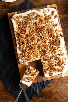 the dessert is ready to be eaten on the wooden cutting board and served with a spoon