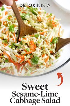 cabbage salad with carrots and celery in a white bowl