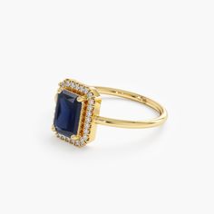 Juliet Art Deco-inspired, this sultry sapphire ring is fit for a queen! Timeless, elegant & dainty, this deep shade of blue framed with sparkly diamonds will make you feel like royalty each time you gaze at your hand. - Handmade- Solid Gold- Natural Diamonds and Sapphire- G Color, SI Quality Diamonds- Total Blue Sapphire Carat Weight: 1.11 ctw- Total Diamond Carat Weight: 0.08 ctw- Setting Dimension: 9.5 x 7.5 mm- Band Thickness: 1.2 mm All pieces come beautifully boxed in suede pouches you can Sapphire And Diamond Engagement Ring, Handmade Fine Jewelry, Blue Frames, Diamond Carat, Color Ring, Art Deco Inspired, Natural Sapphire, Gold Set, Quality Diamonds