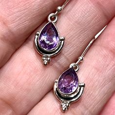 Sterling  Silver Purple Amethyst earrings vintage stunning dangling purple earrings Wonderful paired with a summer outfit. if you love purple these are a must have!  Vintage Marked925 Estate Earrings Teardrop shape Amethyst Perfect  vintage condition. vintage925Silver Purple Sterling Silver Teardrop Dangle Earrings, Purple Long Drop Earrings With Ear Wire, Purple Gemstone Teardrop Dangle Earrings, Amethyst Teardrop Crystal Earrings, Purple Dangle Teardrop Earrings With Ear Wire, Elegant Nickel-free Purple Earrings, Purple Sterling Silver Long Drop Earrings, Nickel Free Purple Crystal Drop Earrings, Lavender Dangle Crystal Earrings