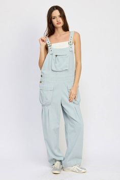 Expertly crafted with 100% cotton, the Emory Park Oversized Cargo Overalls offer superior comfort and durability. Perfect for any occasion, these overalls are a must-have for any wardrobe. SIZE & FIT :MODEL WEARS SIZE SMALLMODEL'S HEIGHT 5'9 Made In : IMPORTED Fabric Contents : 100% COTTON Everyday Bib Front Overalls With Pockets, Washed Blue Cotton Utility Denim Jumpsuit, Utility Overalls With Side Pockets And Loose Fit, Baggy Utility Overalls With Side Pockets, Baggy Blue Overalls With Pockets, Utility Overalls In Washed Blue With Pockets, Utility Cotton Overalls With Pockets, Casual Everyday Bib Front Overalls, Casual Everyday Overalls With Bib Front