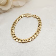 Stunning real 14k gold polished Monaco bracelet with CZ box lock. Perfect for everyday or special occasions. Unique, elegant, and everlasting. 14k gold will not tarnish or rust. Unisex (small length).  Materials: 14k gold, Cubic Zirconia. Lenght: 7 inches Thickness: 8.5mm Weight: 8.7 grams (Aprox) 14k stamped Brand new Hollow but sturdy  Very secure lock Fast shipping A signature will be required when delivered 💓 Briza Collections is a small family business that works hard on providing the best Solid Gold Jewelry, Gold Polish, Small Family, Family Business, Chain Link Bracelet, Link Bracelets, Chain Link, Monaco, Solid Gold