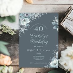 an image of a birthday party with flowers on the front and back of the card