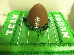 a green cake with a football on top