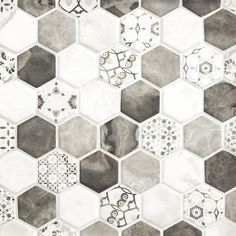 a black and white photo of hexagonal tiles with different patterns on the surface