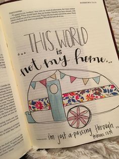 an open bible with the words, this world is not my home on it's page