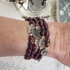 Gorgeous Magnetic Wrap Bracelet with Burgandy Hematite Magnetic Beads have a Heart and 3 other Charms. While the magnetic beads will not heal your arthritis, carpal tunnel, neuropathy, etc..., they may help ease the pain while you are wearing them. They will be the perfect gift for her for Christmas, Birthday, Mother's Day, or yourself. These unique magnetic bracelets are handmade and beaded on stainless steel memory wire that will adjust in size to ensure these wrap bracelets will fit most any Magnetic Bracelets, Magnetic Beads, Beads Christmas, Silvery Blue, Valentines Birthday, Magnetic Jewelry, Carpal Tunnel, Wrap Bracelets, Body Wraps