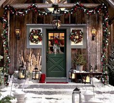 the front door of a house decorated for christmas