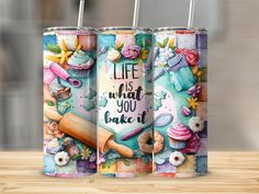 two cans with the words life is what you bake it and cupcakes on them