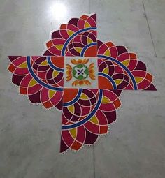 a colorful flower design on the floor