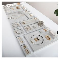 Grey Rock Jewelry Display SetIdeal for highlighting your favorite jewelry and accessories.It’s perfect for retail stores, business shows or personal use at home.FEATURES- A great choice for storing and displaying all of your accessories to keep your vanity neat and organized.- Perfect solution for holding and displaying your bracelets, necklaces, watches and hair ties...and so on.- It could be placed in the bathroom, bedroom, vanity, storefront windows because it's perfect for showcasing your it Minimalist Jewelry Display, Storefront Windows, Jewelry Display Booth, Creative Jewelry Displays, Jewelry Table Display, Diy Earring Holder, Jewelry Shop Display, Jewelry Store Displays, Grey Rock