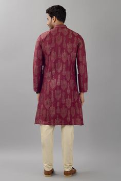 Dark plum muga silk kurta with thread embroidery. Comes with pant.
Components: 2
Pattern: Embroidered
Type Of Work: Thread
Neckline: Mandarin Neck
Sleeve Type: Full
Fabric: Muga silk
Color: Purple
Other Details: 
Front concealed placket on kurta
Occasion: Sangeet - Aza Fashions Muga Silk, Types Of Work, Silk Kurta, Thread Embroidery, Silk Thread, Pant Set, Embroidered Silk, Aza Fashion, Sleeve Type